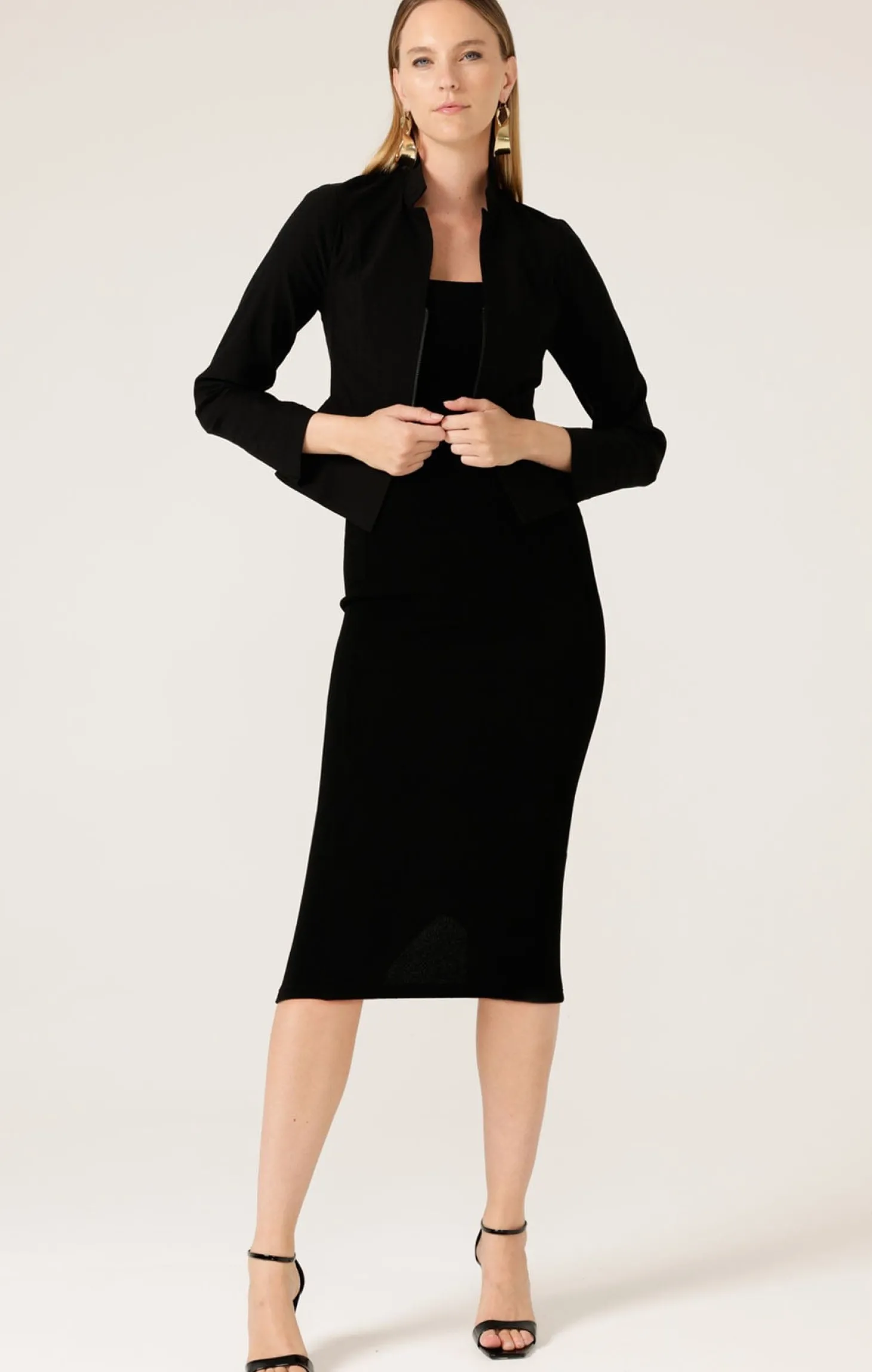 FRONT ZIP PEPLUM JACKET IN BLACK