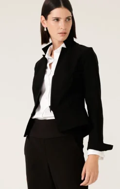 FRONT ZIP PEPLUM JACKET IN BLACK