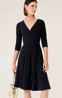 REVERSE WRAP DRESS IN NAVY