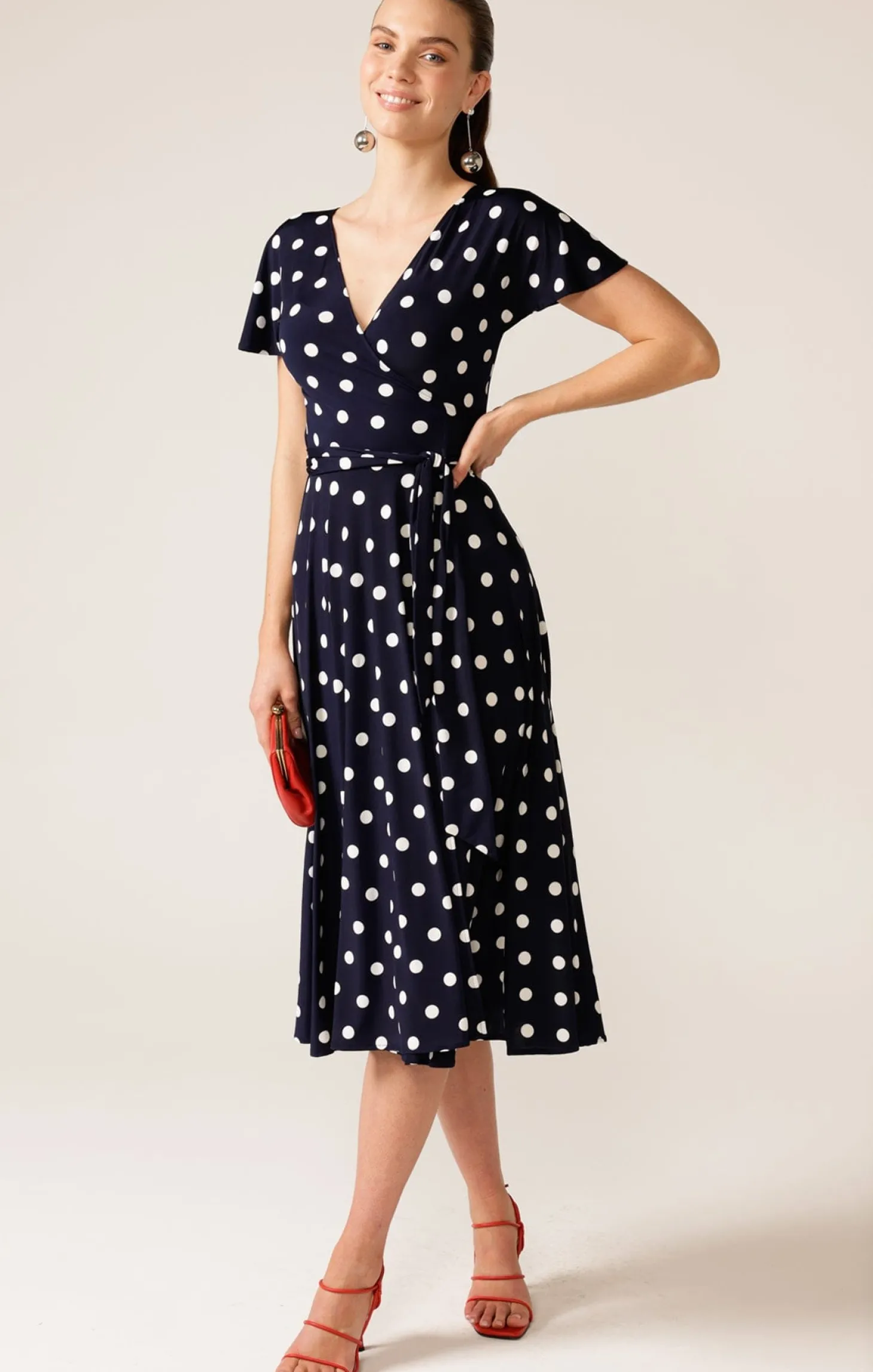 REVERSE WRAP MIDI DRESS IN NAVY WHITE SPOT
