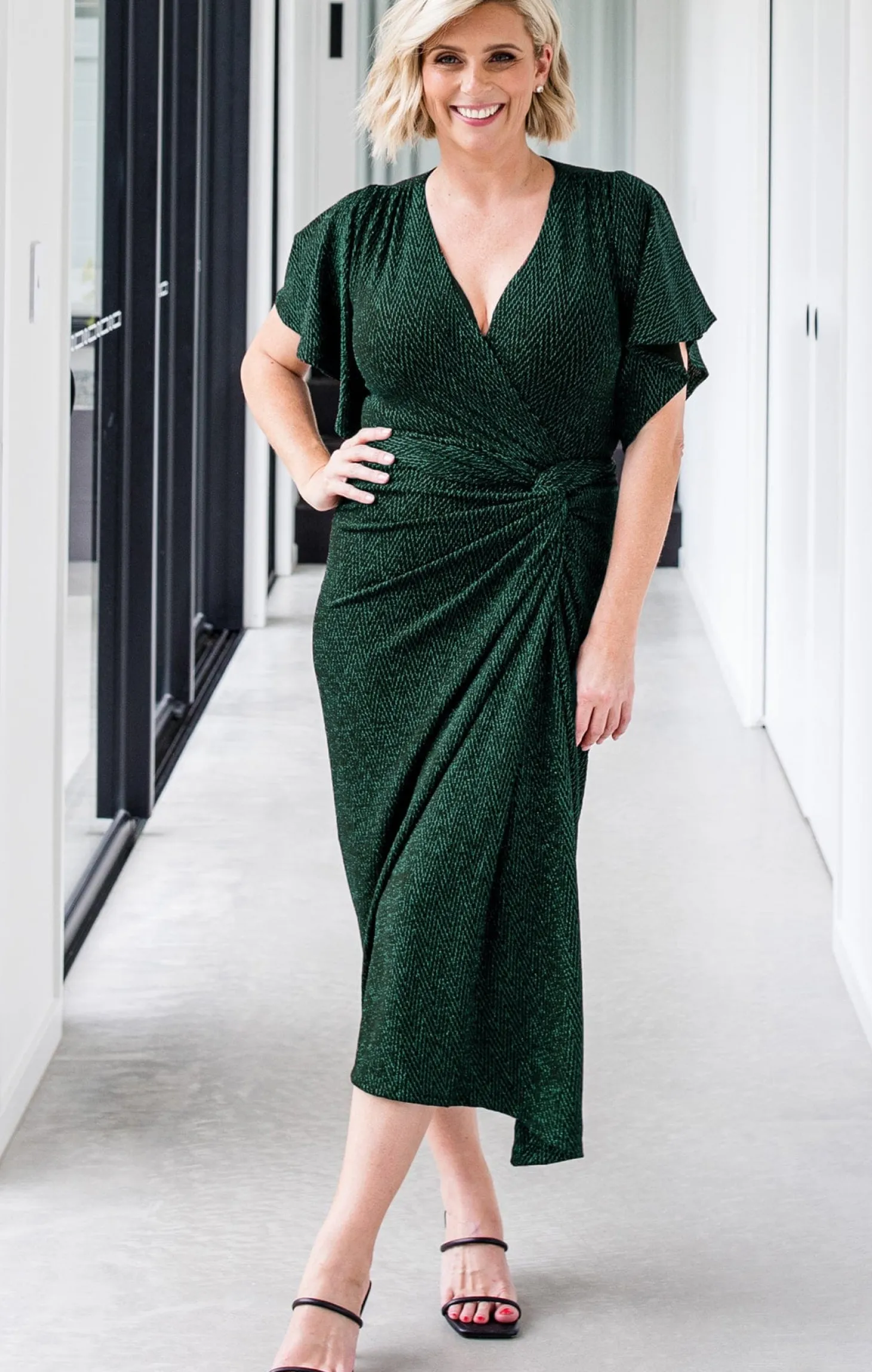 THE EMPORIUM DRESS IN EMERALD